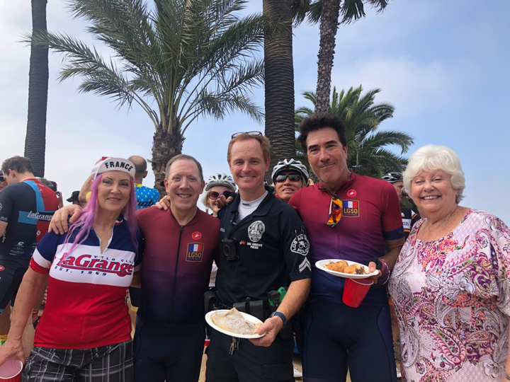 Raymond’s daughters, Zizi on the far left, and Raphaele, on the far right, were able to join in the festivities. LAPD officer Rusty Redican escorted the club through the streets of Los Angeles and was able to enjoy the festivities at the end of the ride.