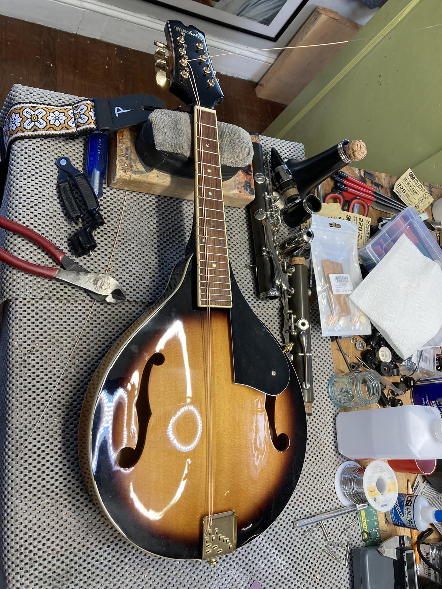 Mandolin bridge fit and piezo pickup install with a setup.