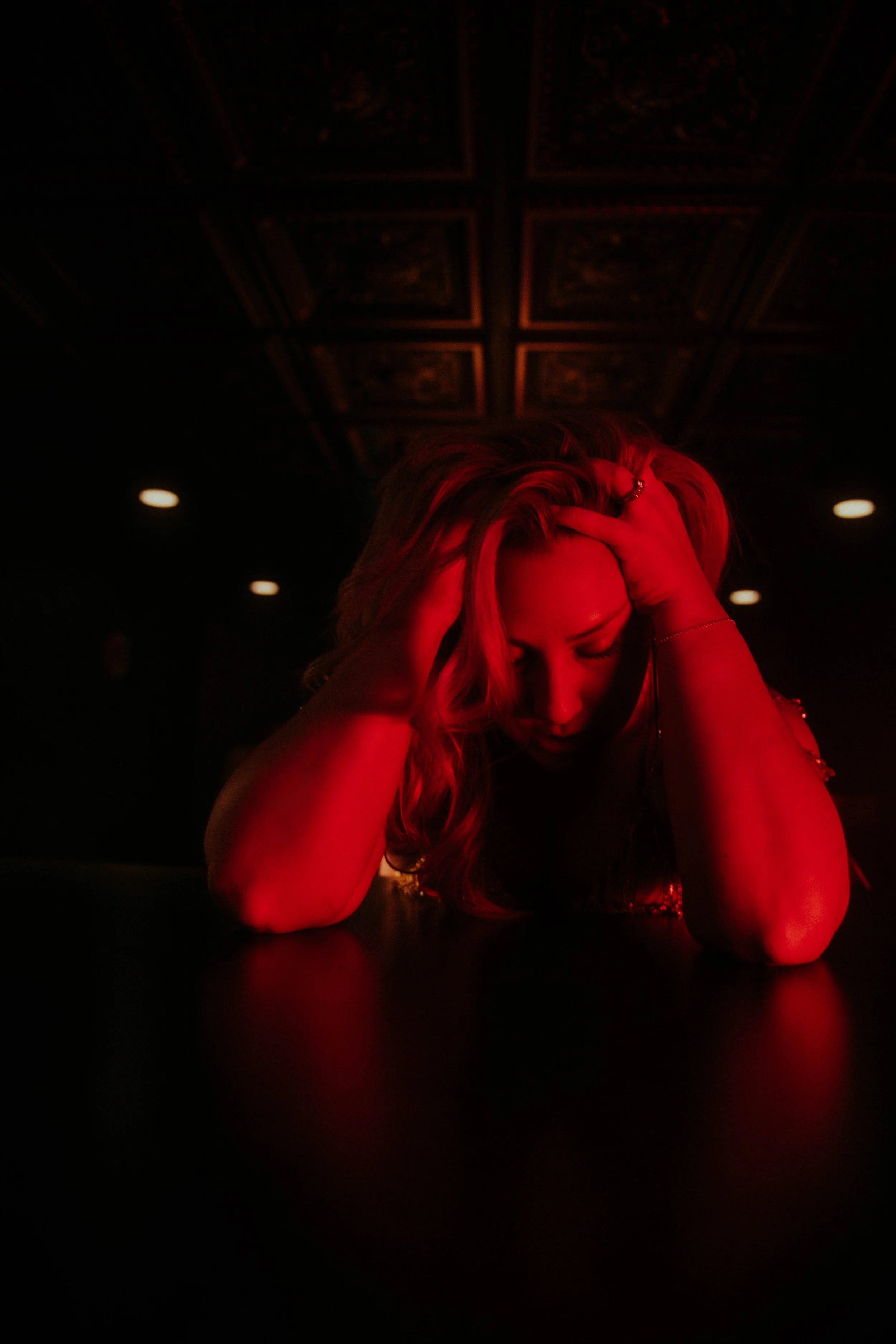 Studio portraits featuring dramatic shadow and warm tones