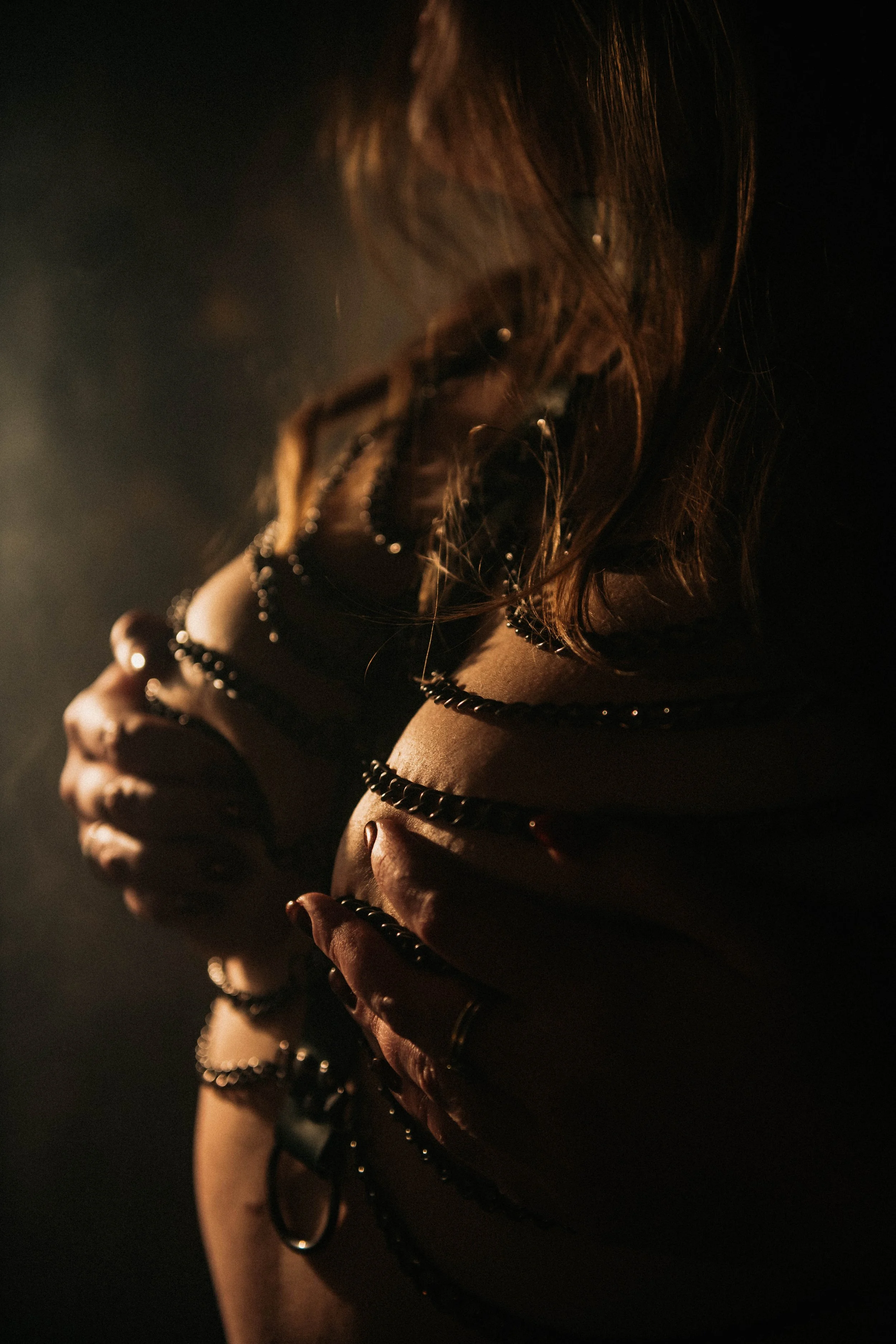 Boudoir photography session featuring a seated pose in Terre Haute, Indiana