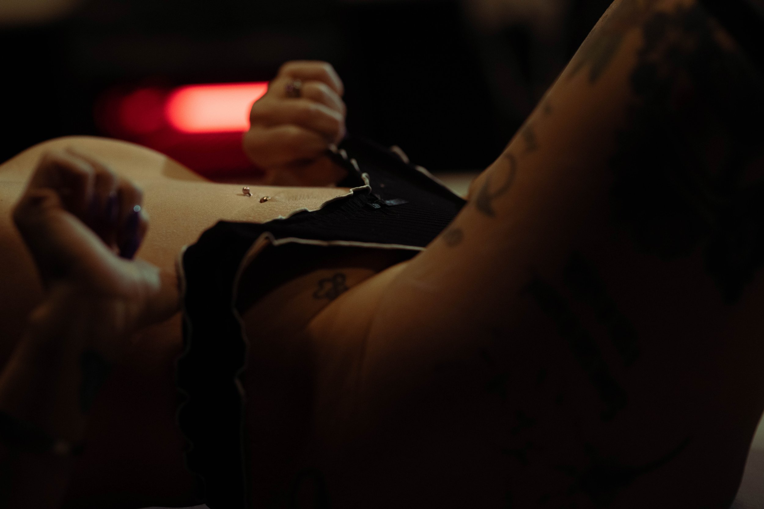 Terre Haute boudoir session in kitchen setting with moody lighting and intimate pose