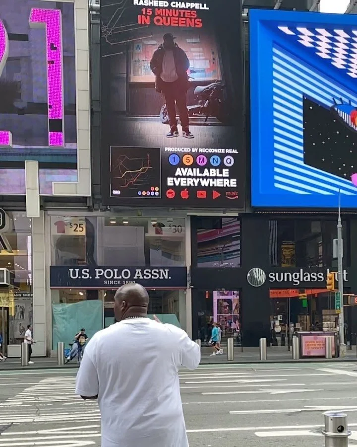 Rasheed Chappell celebrates with Times Square billboard, Audiomack trending, VEVO playlisting, and Kazi article