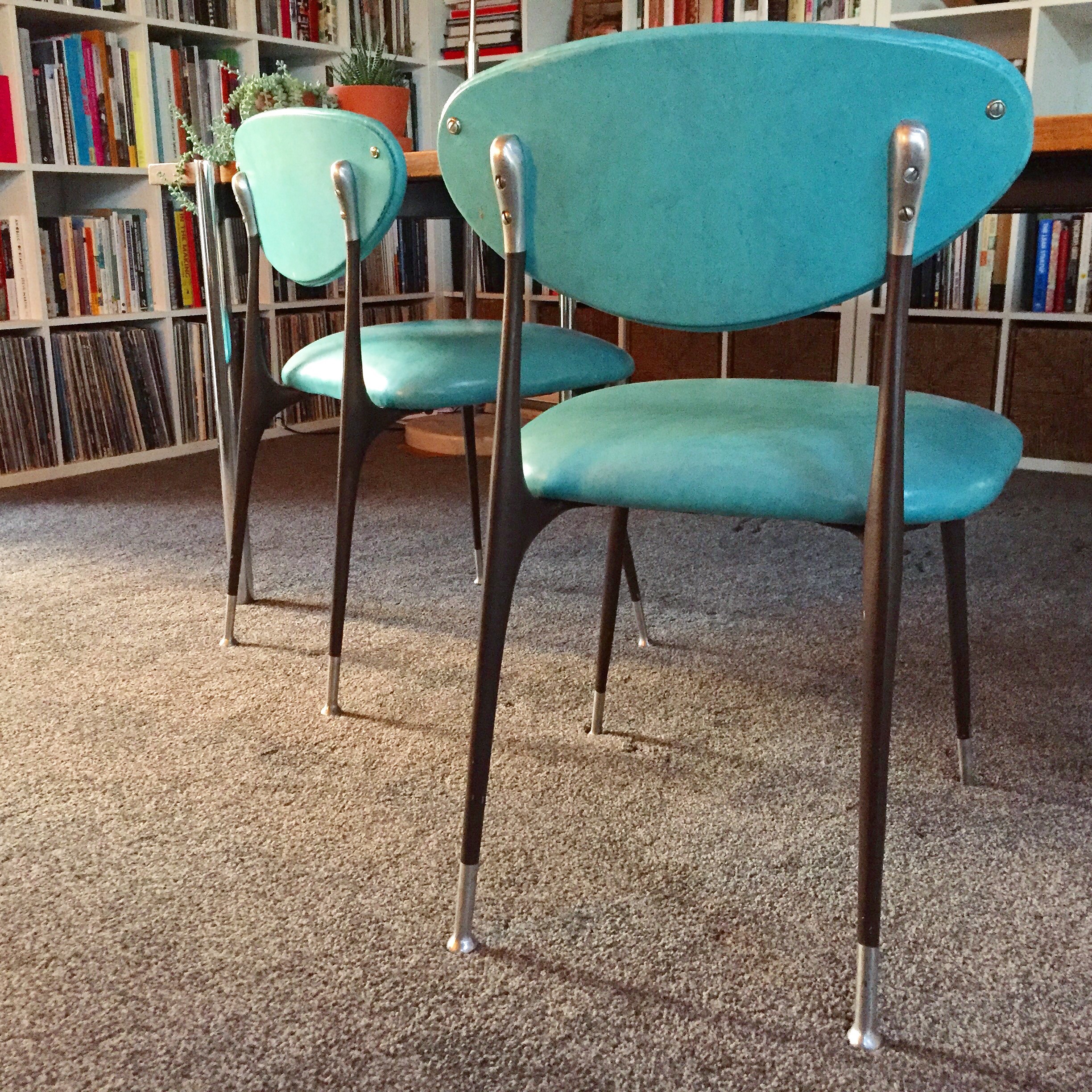 Den with teal chairs.jpg