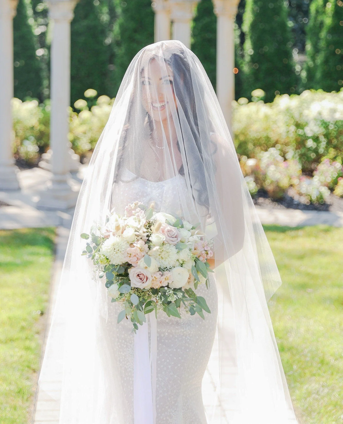 Veils are having their moment... and for good reason. There&rsquo;s just something undeniably romantic about that soft, sheer layer catching the light. This long cathedral veil added the perfect touch of elegance and drama, completing the look in the
