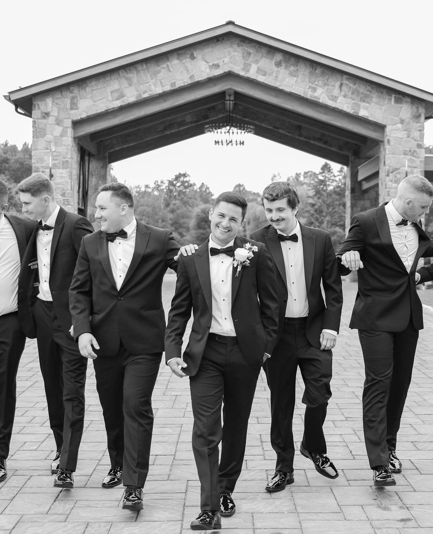 The groom and his crew 🖤
Groom and groomsmen portraits don&rsquo;t get enough love. The jokes, the laughs, the energy &mdash; plus all the little tie and cufflink fixes that tell the story of the day. And black-and-white portraits? Always timeless.
