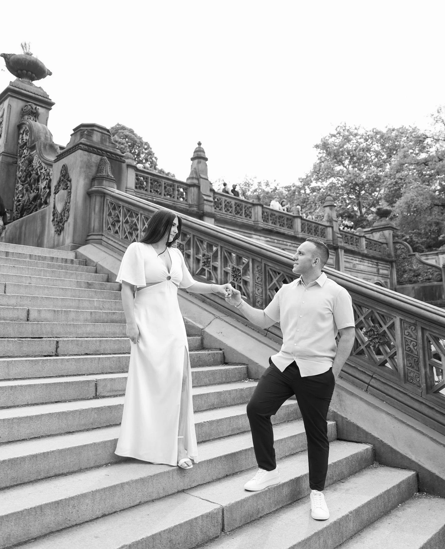 Central Park engagements always hit differently, the stone staircases, hidden arches, soft light, and that just-us-two energy even in the middle of the city.

No stiff posing. Just walking hand in hand, laughing between frames, leaning into each othe