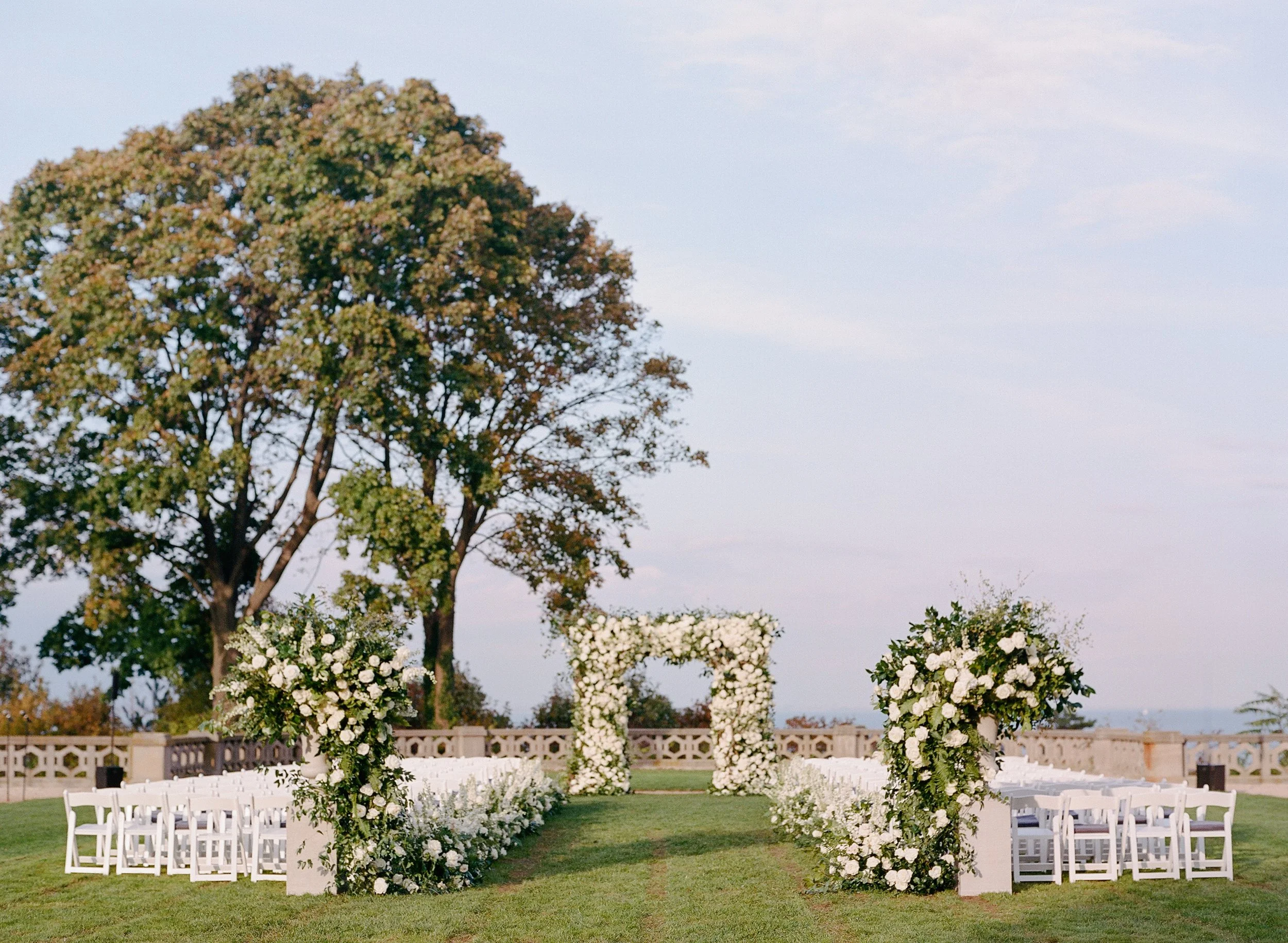 The ceremony location for The Knot Dream Wedding at The Hempstead House, Sands Point, NY. Luminous Sounds provided music for ceremony, cocktail hour and dinner.