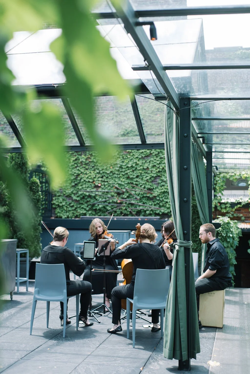 Luminous Sounds String Quartet + Percussion performing outside at The Foundry, Long Island City, NY