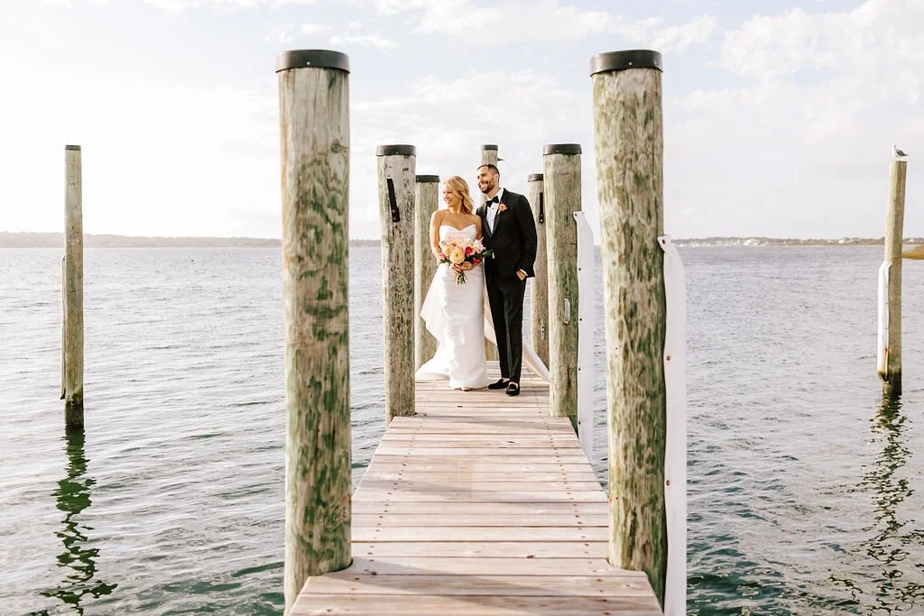 Newly married couple on the dock at Montauk Lake Club. Luminous Sounds provided music during their wedding ceremony and cocktail hour. 