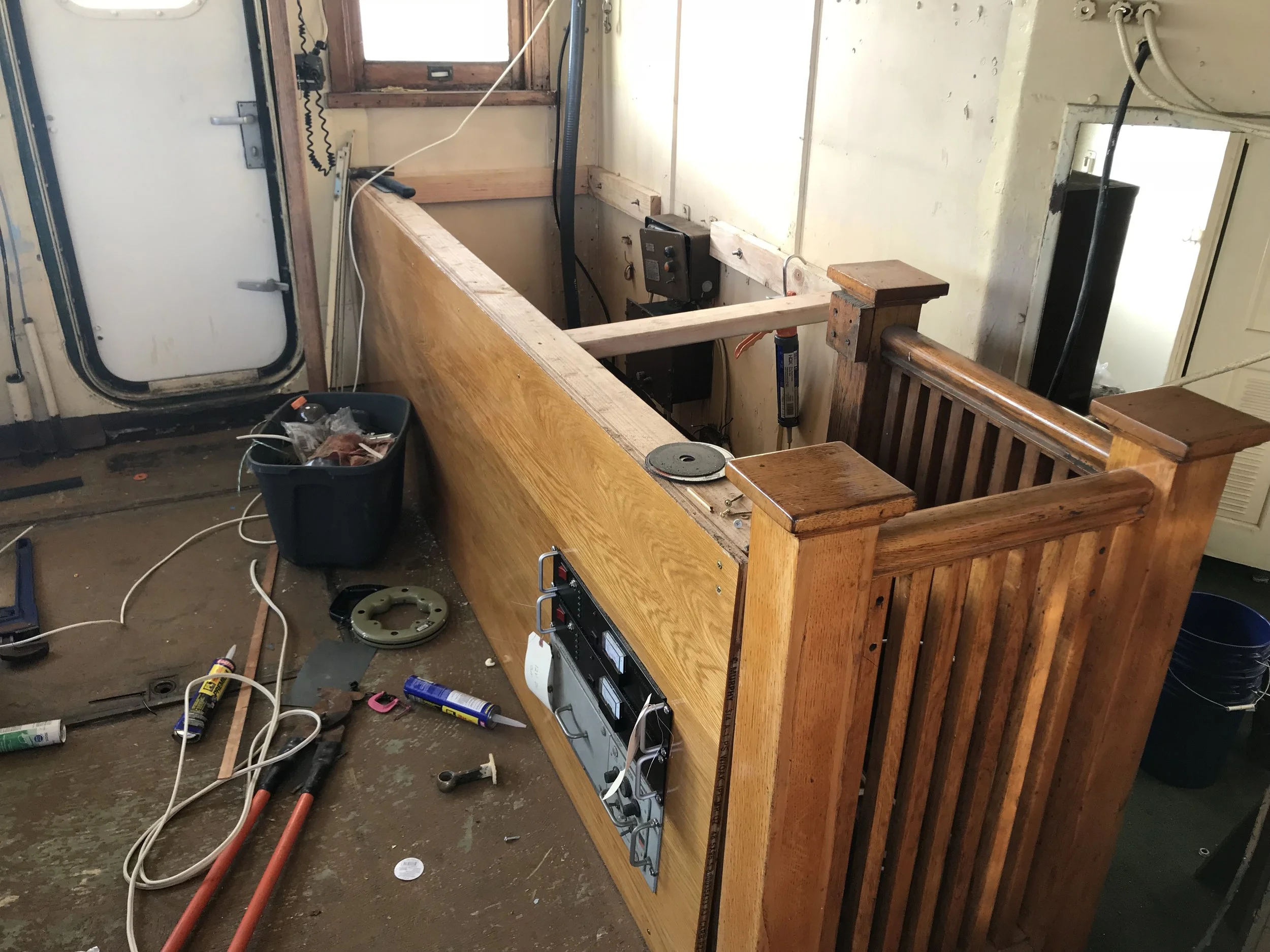 The new settee behind the "Close Quarters" console, The base of the cabinet houses the DC power supplies and future air conditioning system. 