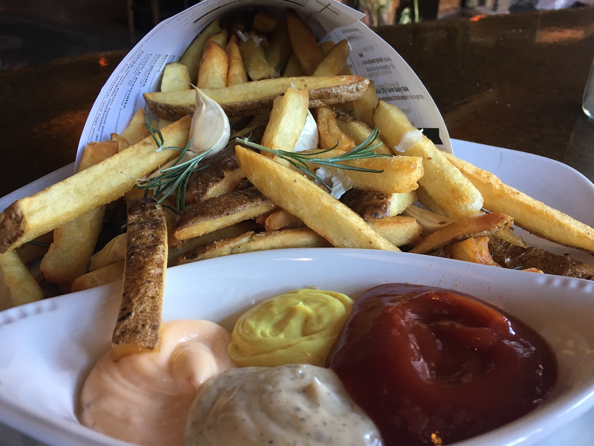 Bar Cento's infamous duck fat fried fries...and quartet of ketchups and mayos.