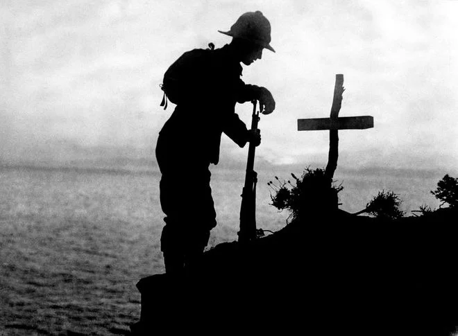 19-soldier-at-graveside.jpg