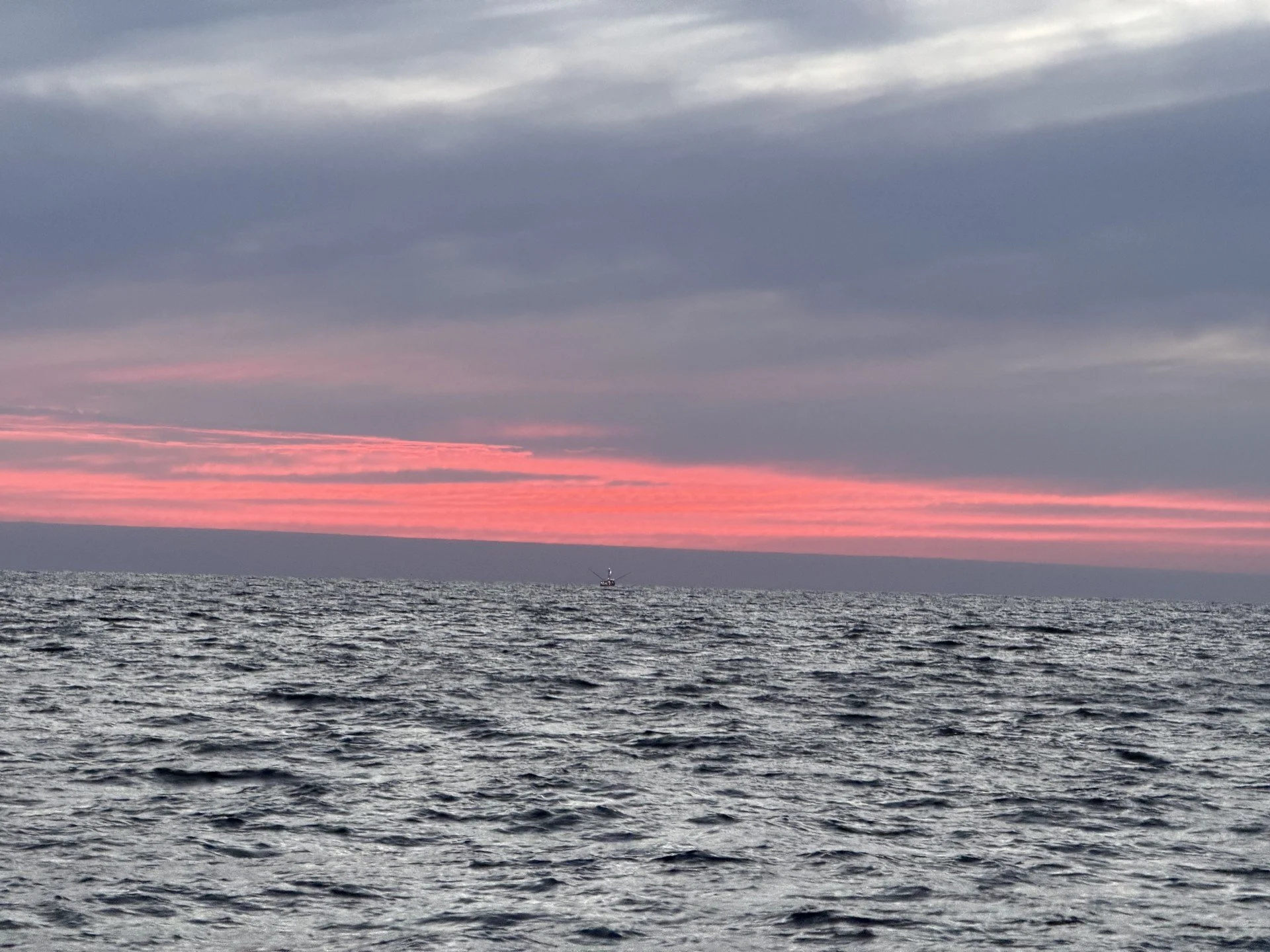 Sunset offshore as we approach The Prairie with a distant Troller