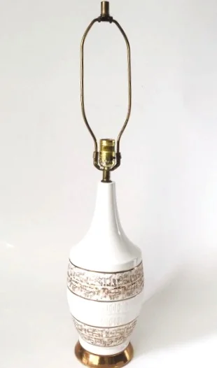 Mid-century Italian white and gilt decorated pottery lamp. 6x30inH. $165.