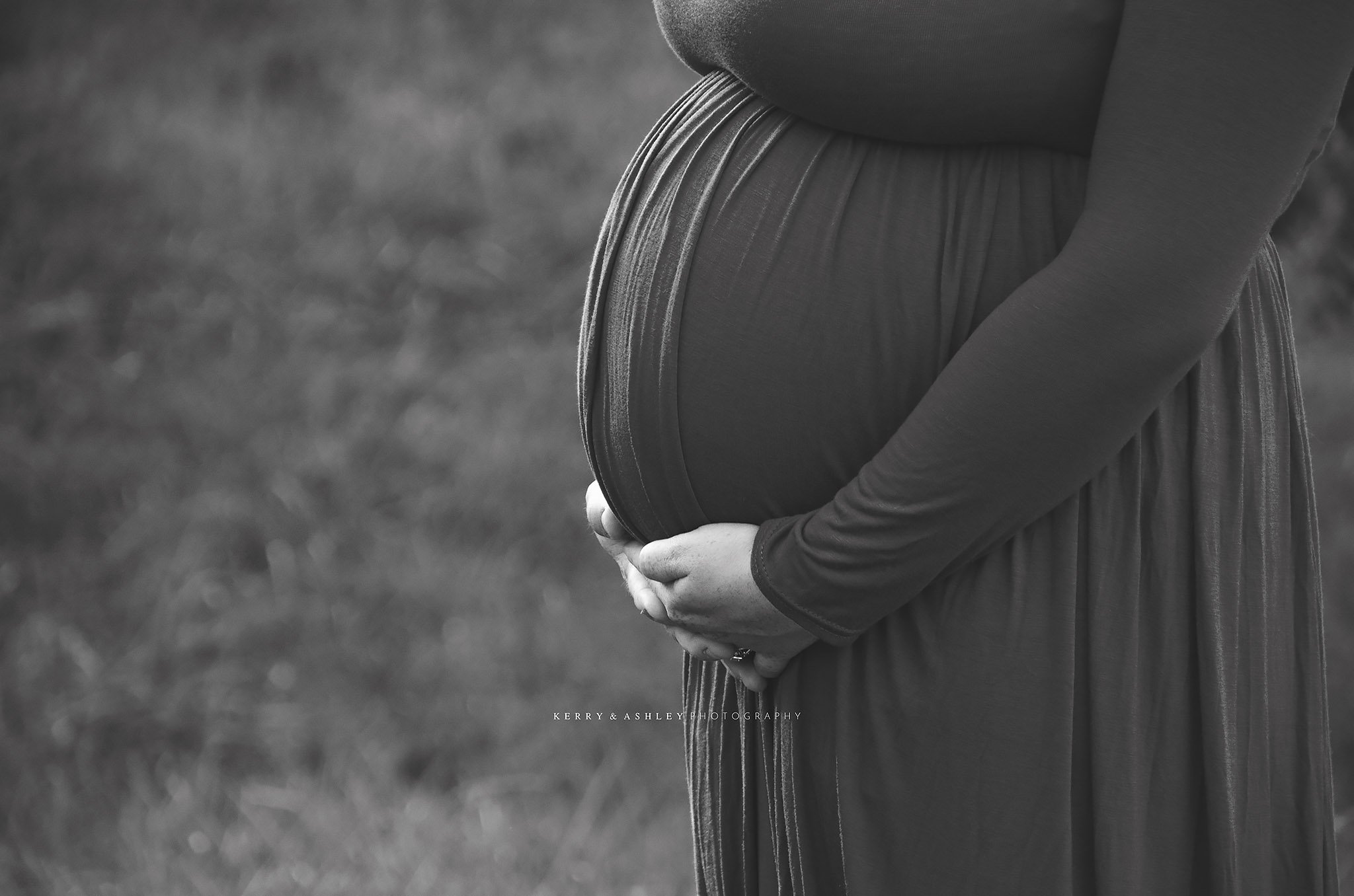 pregnant-mom-holding-belly.jpg