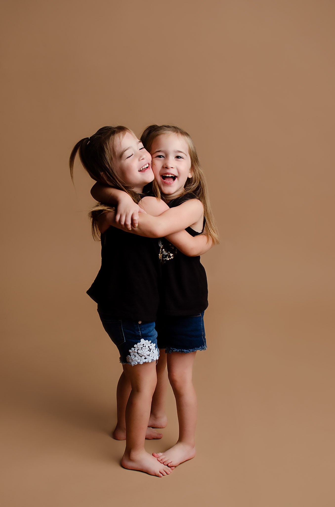 twin-sisters-hugging.jpg