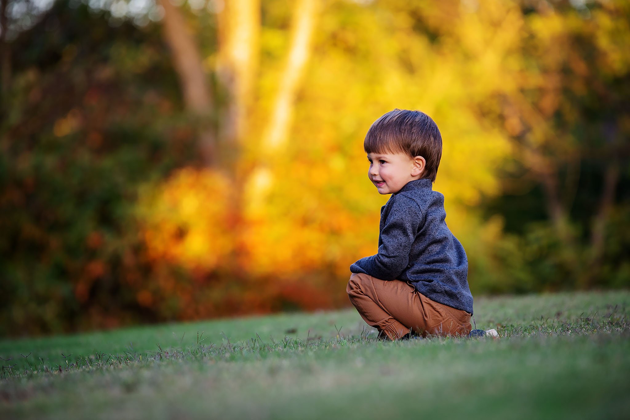 toddler-boy-kneeling-outside-at-sunset.jpg