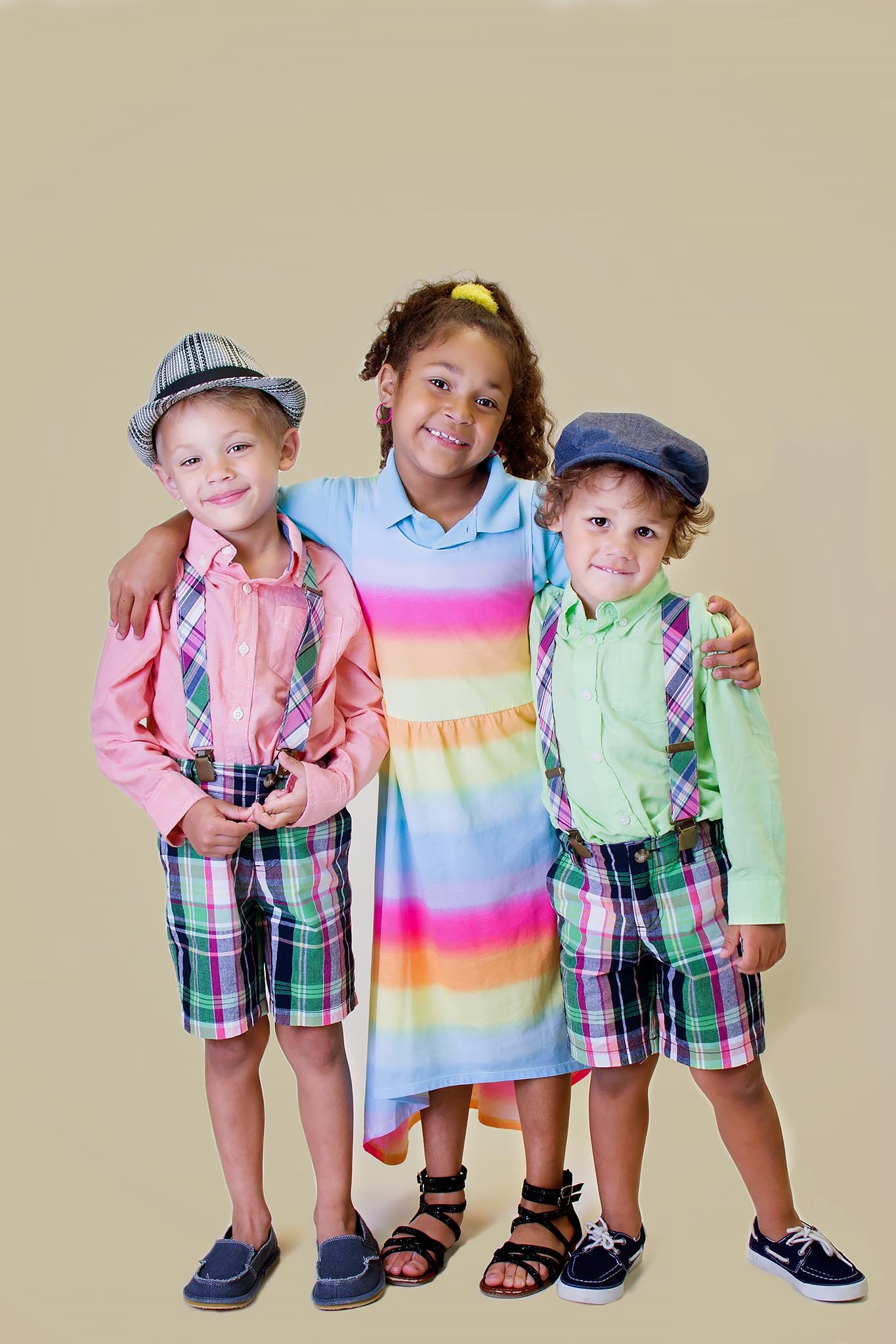 brothers-with-sister-in-rainbow-outfits.jpg