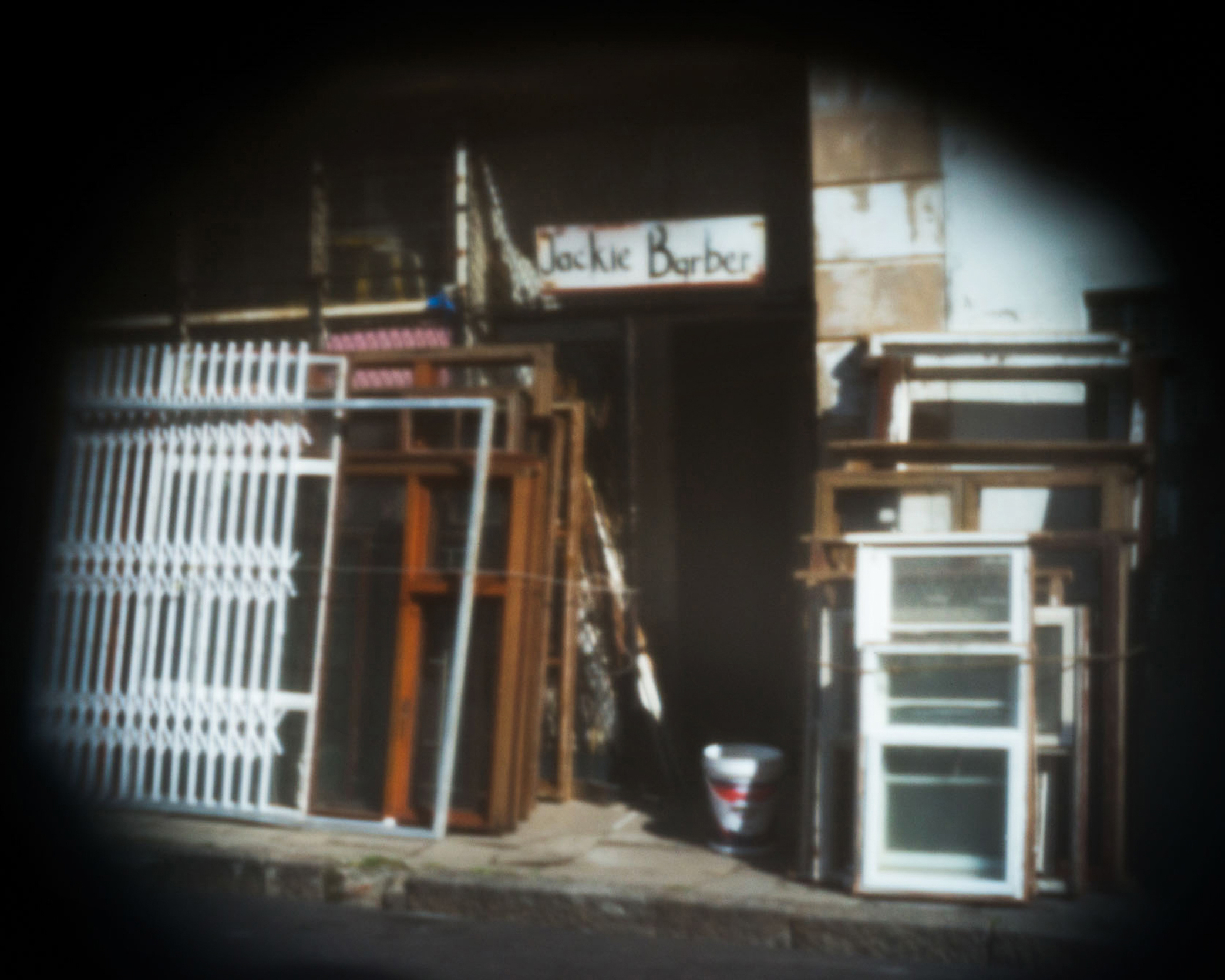 Cluttered shop front on Victoria Road