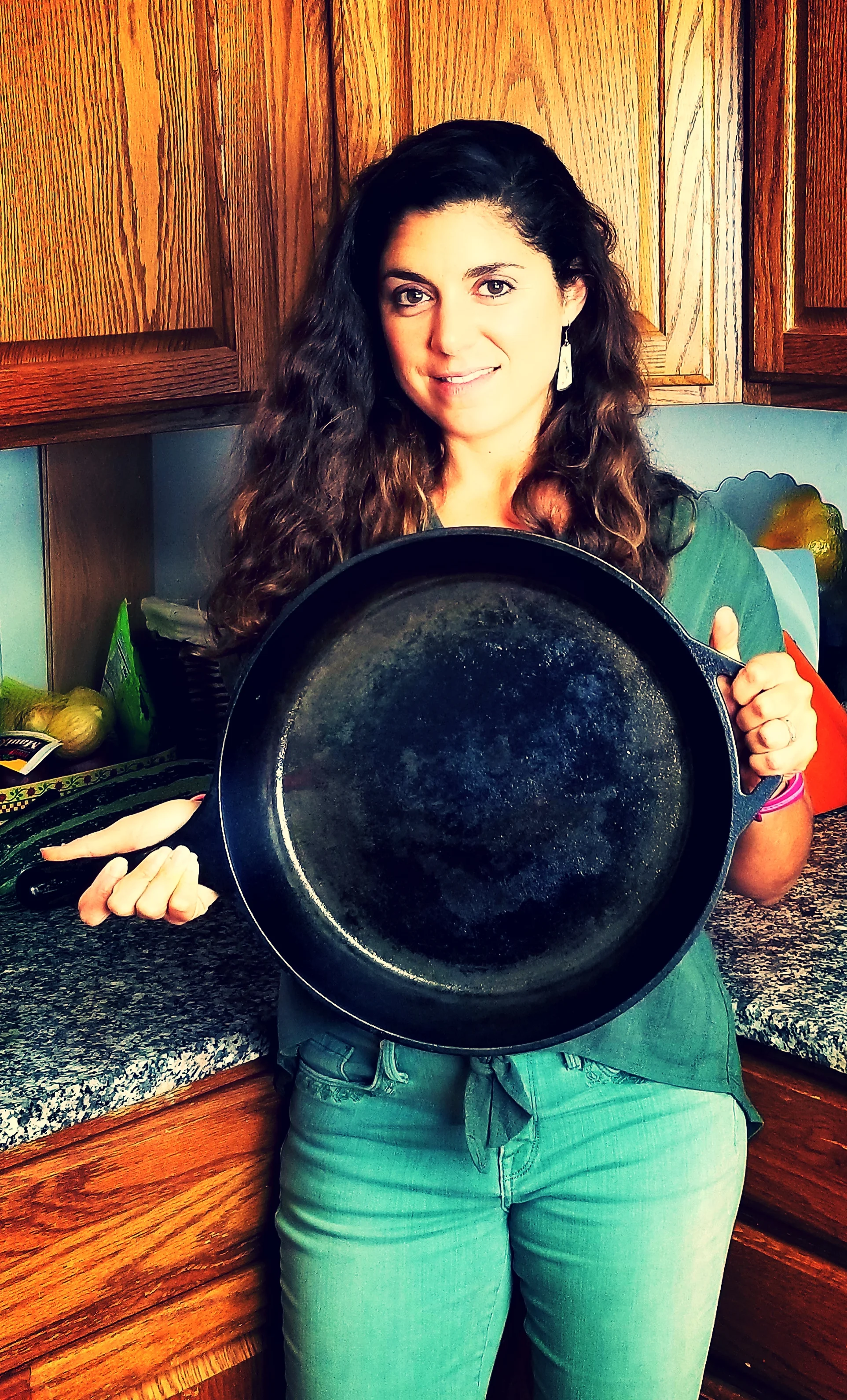 I love to cook with cast iron! I have skillets in 4 sizes (the one I’m holding here is the 14-inch skillet).