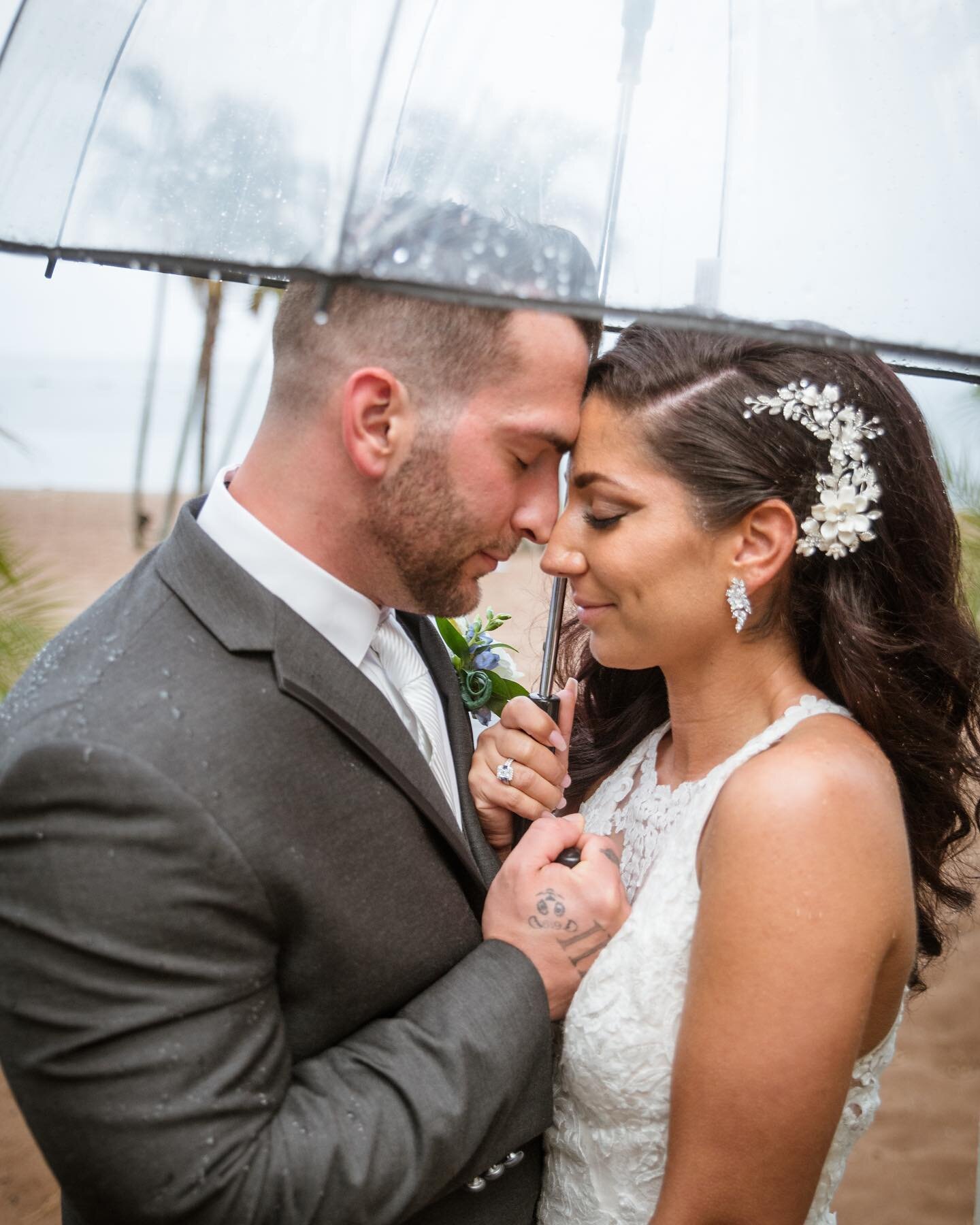 Rainy wedding days are good luck! And we&rsquo;ll always have a clear umbrella to get these beautiful pictures. ☔️ 
.
.
.
#rainydays #rainyweather #anthonysoceanview #ctwedding #ctweddingphotographer #connecticutwedding #connecticutweddingphotographe