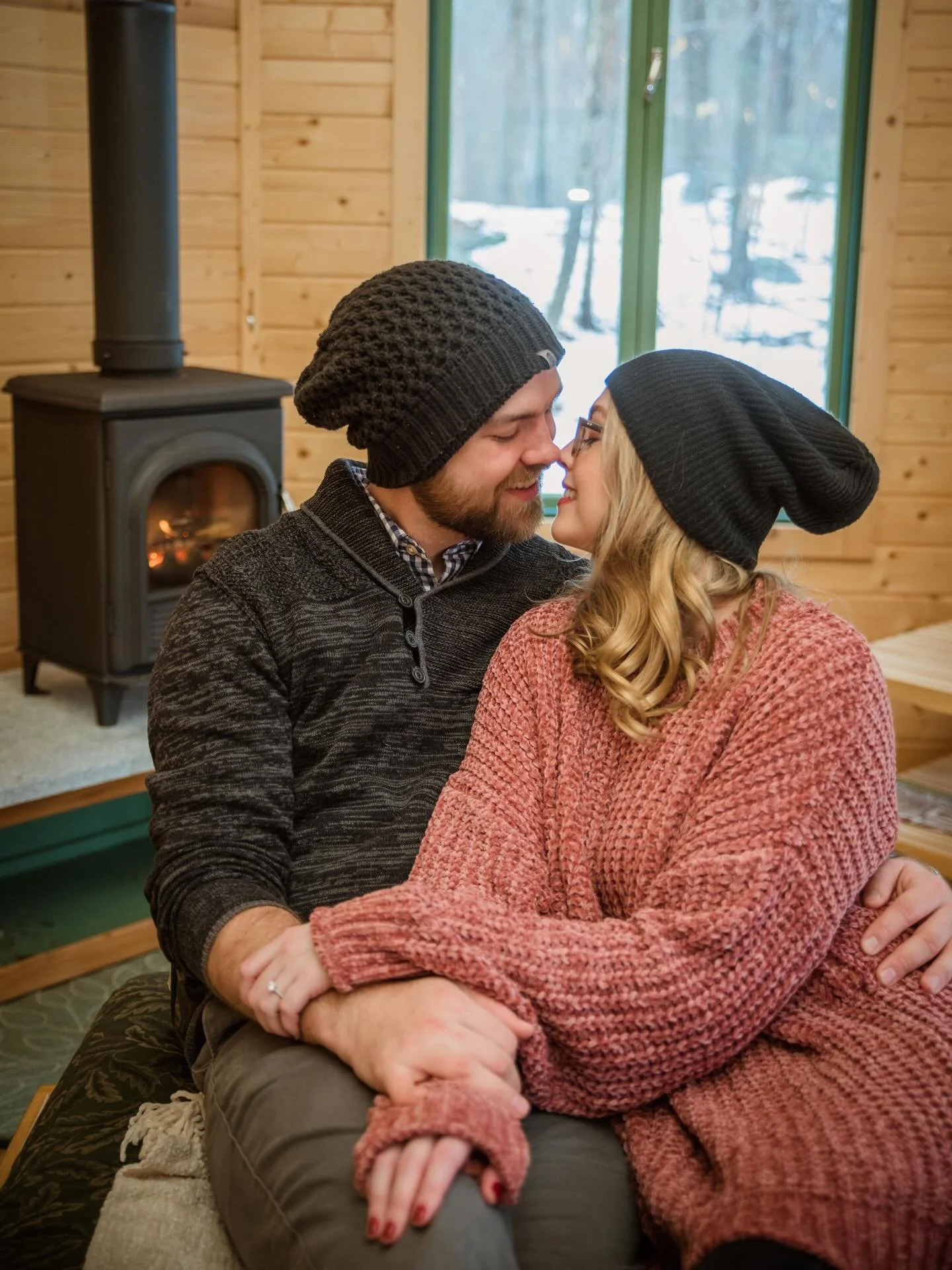 This snowy and cold weather reminded me of one of my favorite engagement shoots. Sam and Kristy&rsquo;s! They did their engagement shoot in Sam&rsquo;s mother&rsquo;s yurt in her backyard.  It was perfect and cozy and the fire and snow really added t