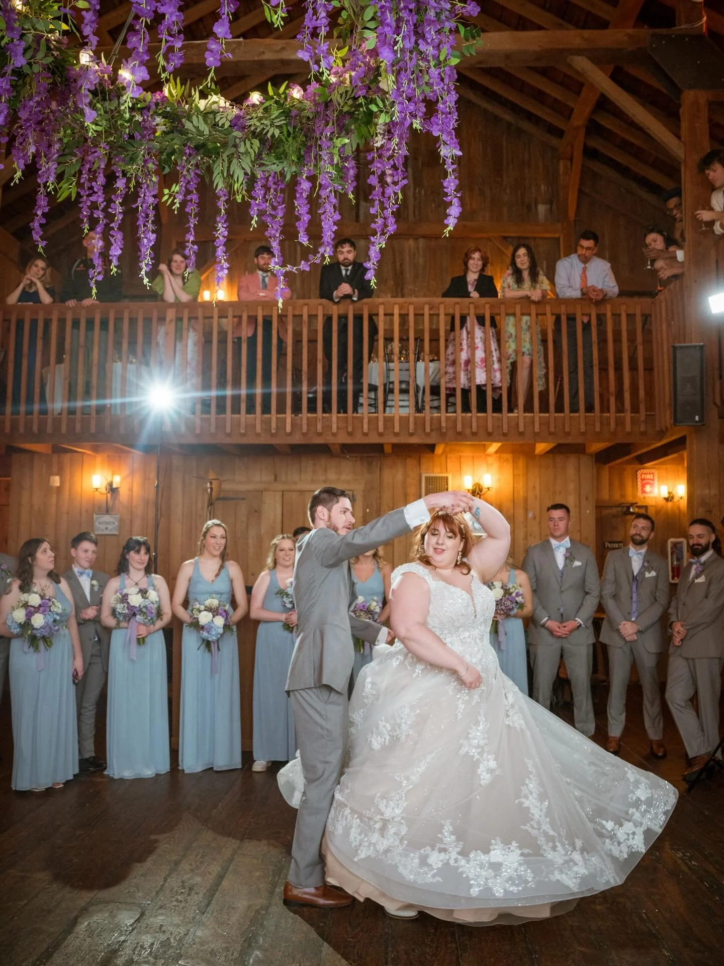 Choreographed first dances are always so beautiful. Robyn had the perfect dress to be twirled around in. So elegant and the train was stunning. They also added these beautiful florals to the chandeliers that really added to the whimsical beauty of th