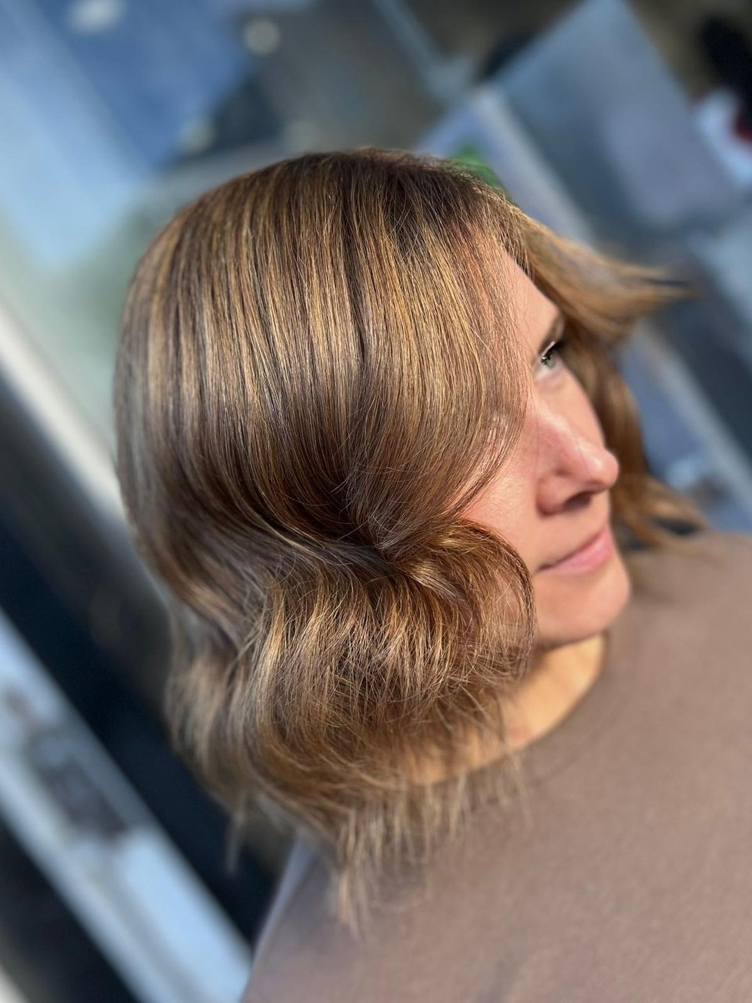 iding the waves of elegance with shoulder-length perfection! 🌊 

Our client's light brown waves are the epitome of effortless chic. Ready to embrace the natural beauty of cascading waves? Click the link in our bio and let's make your wavy dreams a r