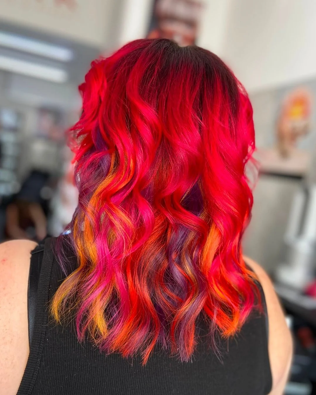 Vibrancy. 🩷🧡

A bold and bright change for this stunning guest, a fiery pink with some colourful ribbons underneath, finished off with some gorgeous curls. 🌈

Looking to take a bold leap, DM us for your personalised consultation. ✨