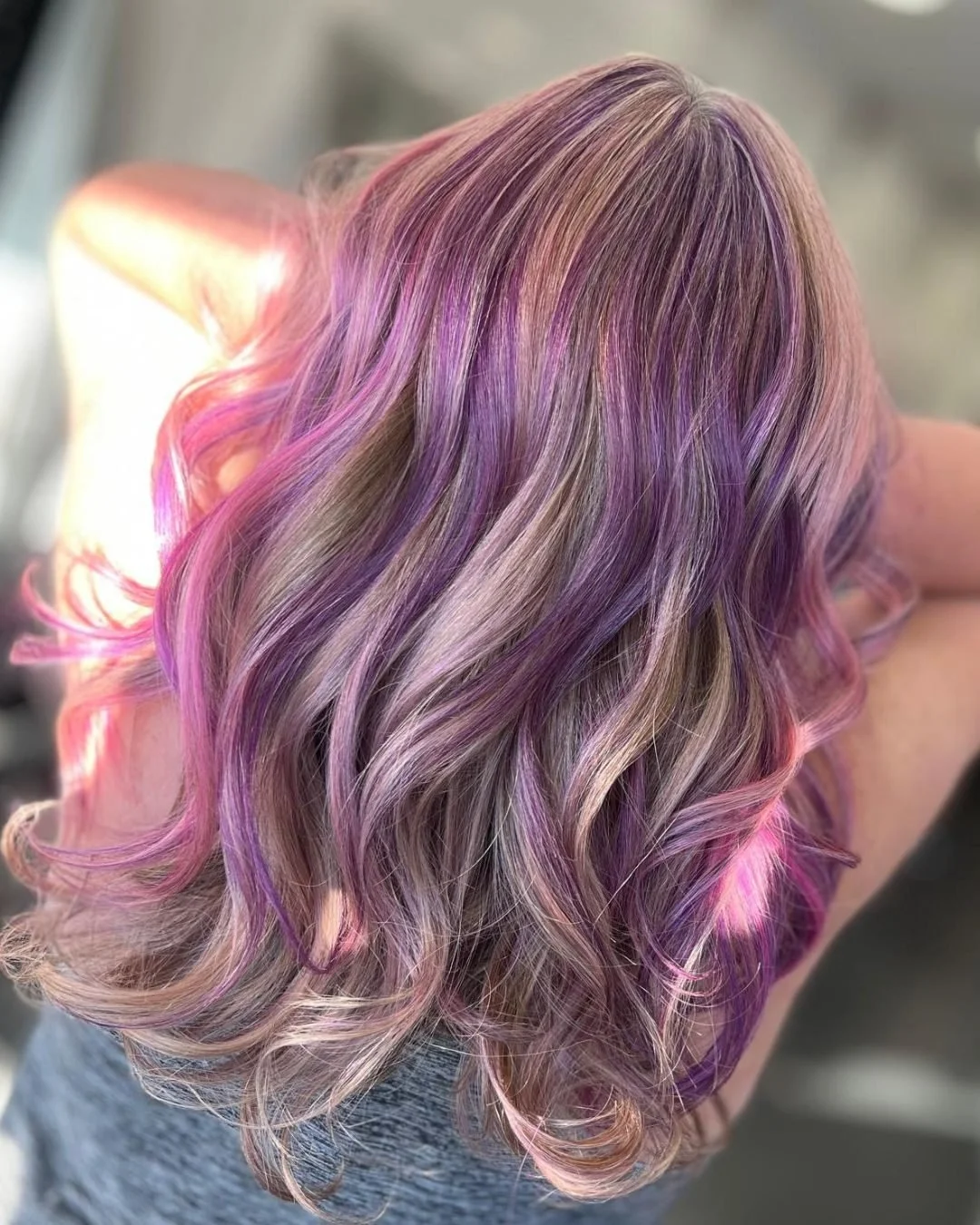 A pop of violet. 🍬

This custom colour blend is the perfect mix of soft, bold and beautifully dimensional - finished with bouncy curls to show off every shade. 🤍

Ready to turn heads with your next transformation? DM us to chat or head to the link 
