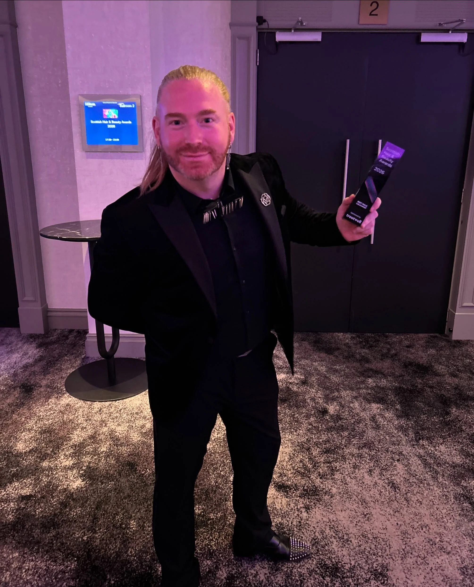 Right off the stage - meet Scotlands Best Male Colourist 2026 @roar_ginger @shaba_awards 🦁🧡 we could not be more proud! 

Team ROAR 🧡🦁