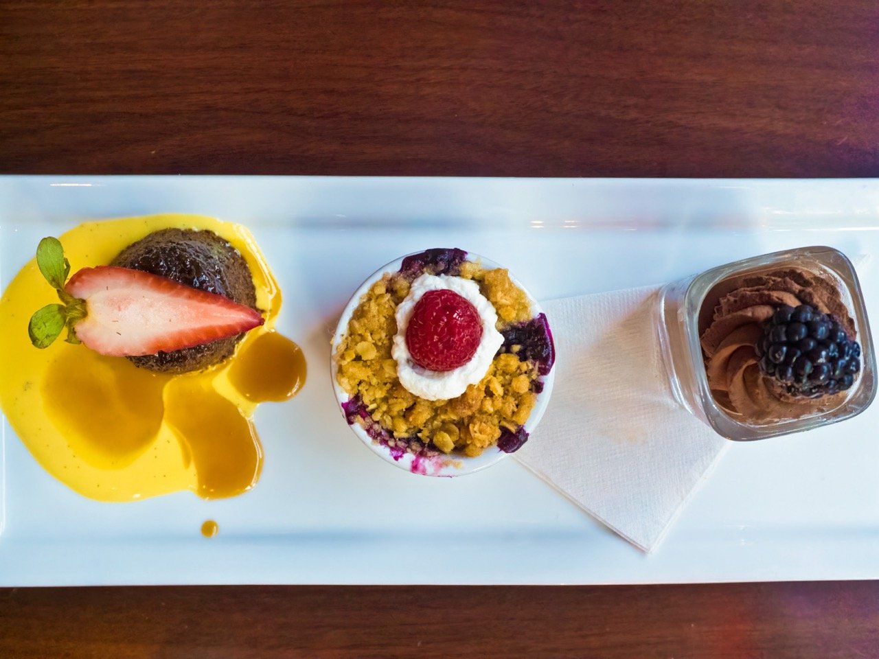 Biga on the Banks Restaurant, dessert sampler, L-R sticky toffee pudding + warm berry crumble + chocolate mousse. Photo by Gary Crallé_5220183-topaz Large.jpeg