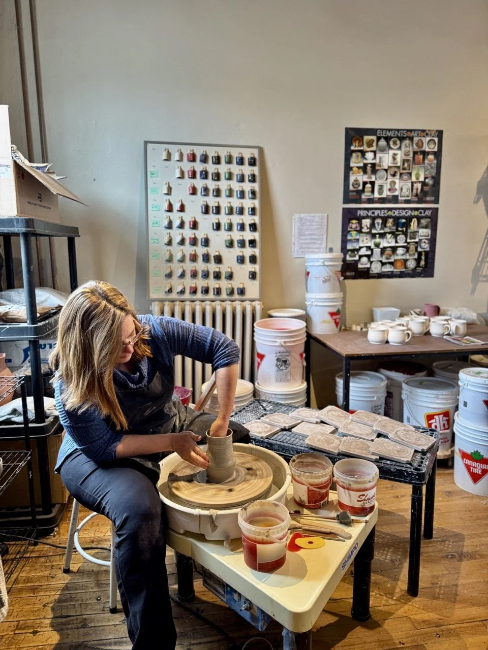 Angela at work on the potter's wheel