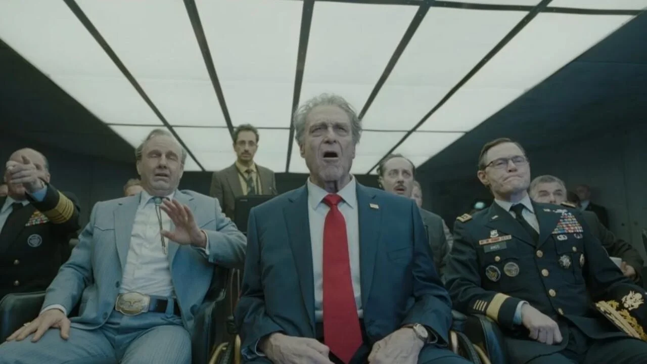 A still image from 'Digger' showing John Goodman as President Compson.