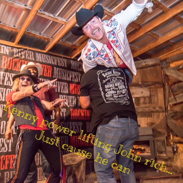 Kenny power lifting his buddy John Rich