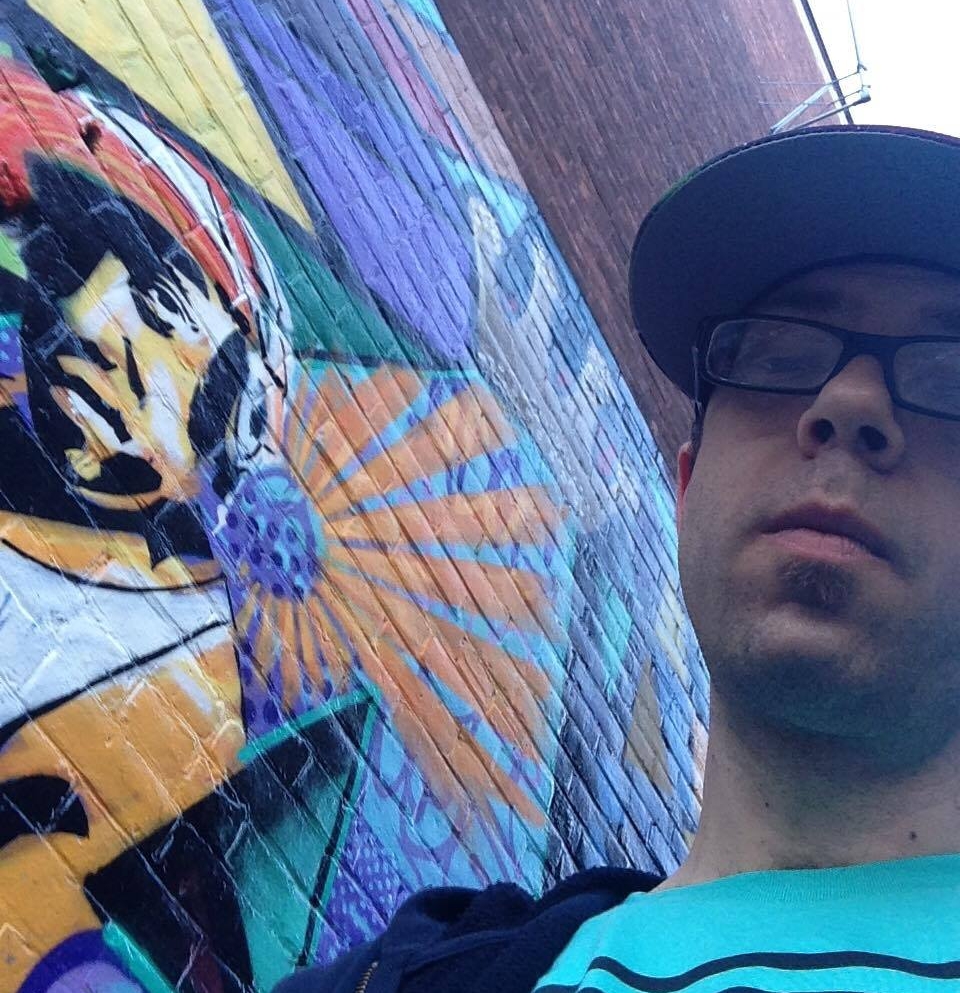 DJ Rekkon is remembering Andy "A_Dog" Williams outside of Nectar's