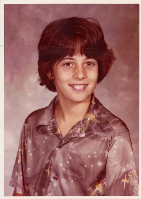 Me in sixth grade, wearing my favorite shirt. It was 100 percent genuine polyester and adorned with fake X-wing fighters. For some reason, I was not voted "best dressed" that year. Or in any year thereafter. 