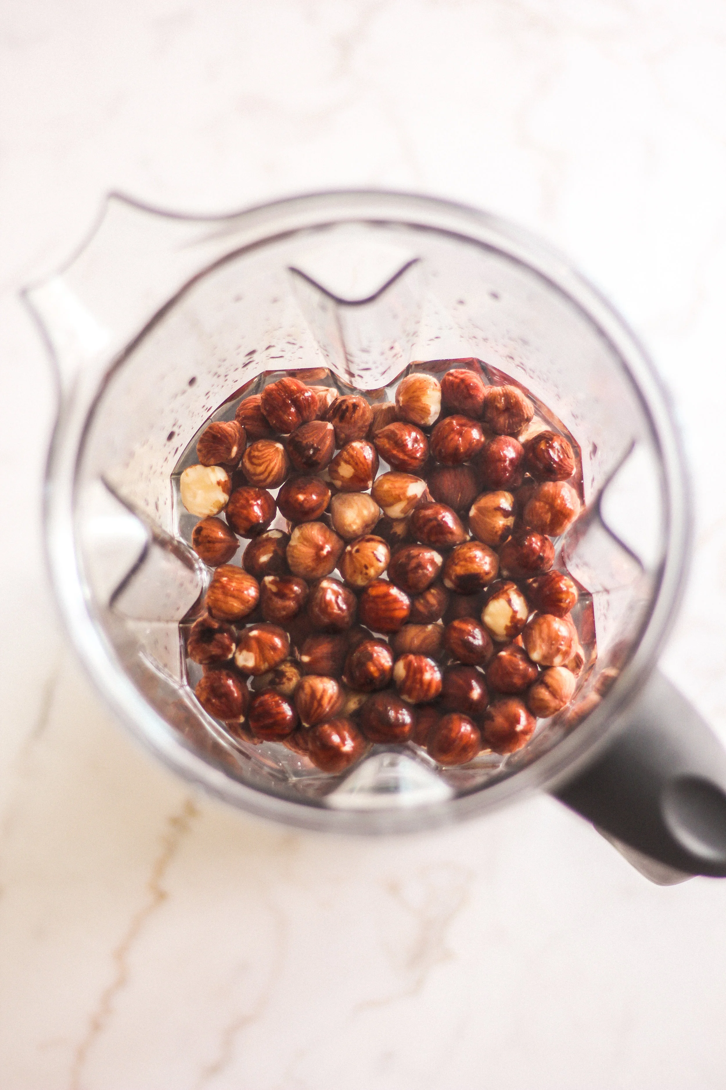 Blend water and soaked hazelnuts on high until thoroughly combined (about 1-2 minutes).