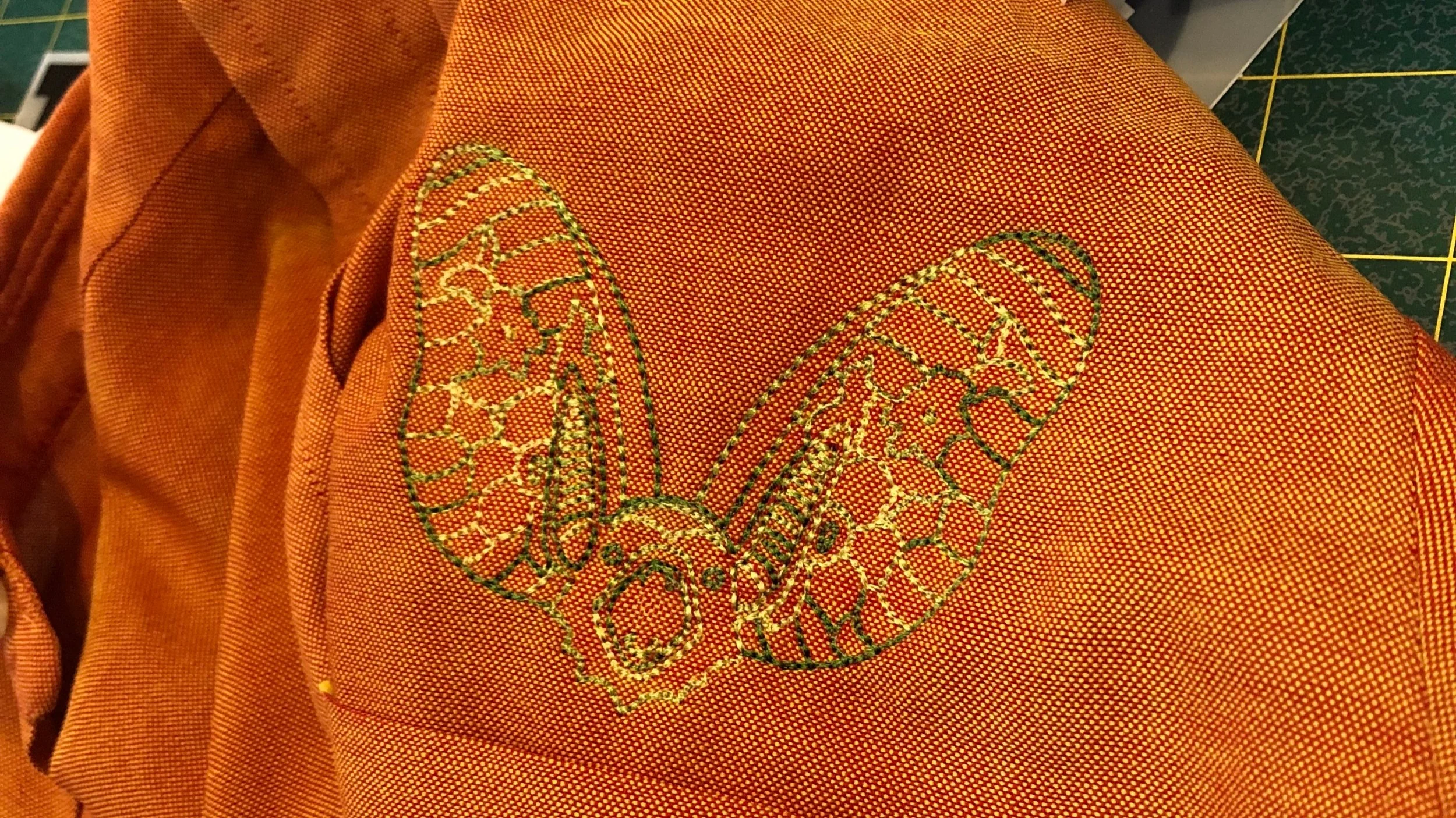 Pre-made design on a crop-top, embroidered at Mia Vesper’ s store in New York City.