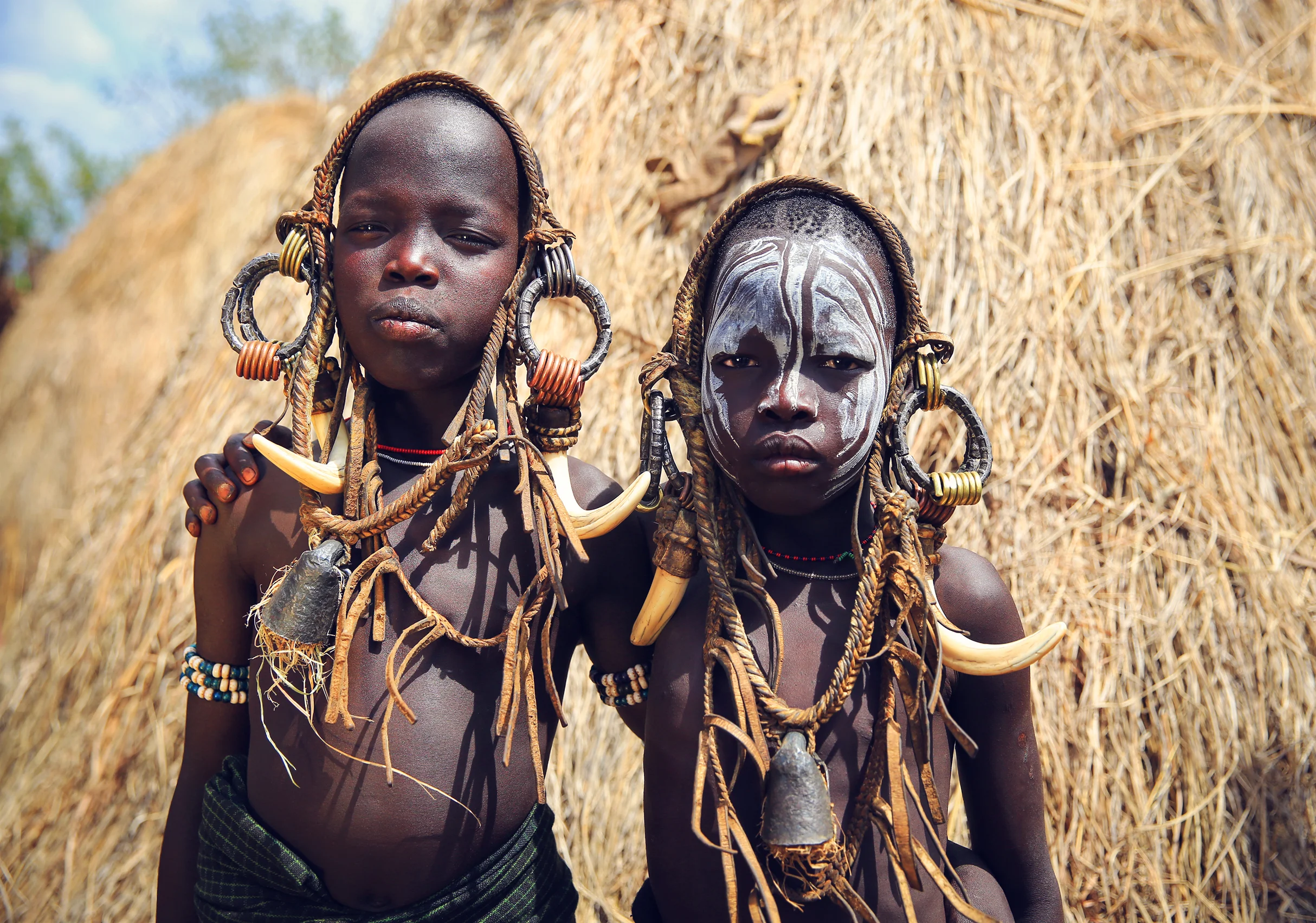 The Mursi (or Mun as they refer to themselves) are a N ilotic pastoralist ethnic group in Ethiopia. They principally reside in the Southern Nations, Nationalities close to the border with South Sudan. According to the 2007 national census, there are 7,500 Mursi, 448 of whom live in urban areas. Surrounded by mountains near the Omo River , the home of the Mursi is one of the most isolated regions of the country. 
