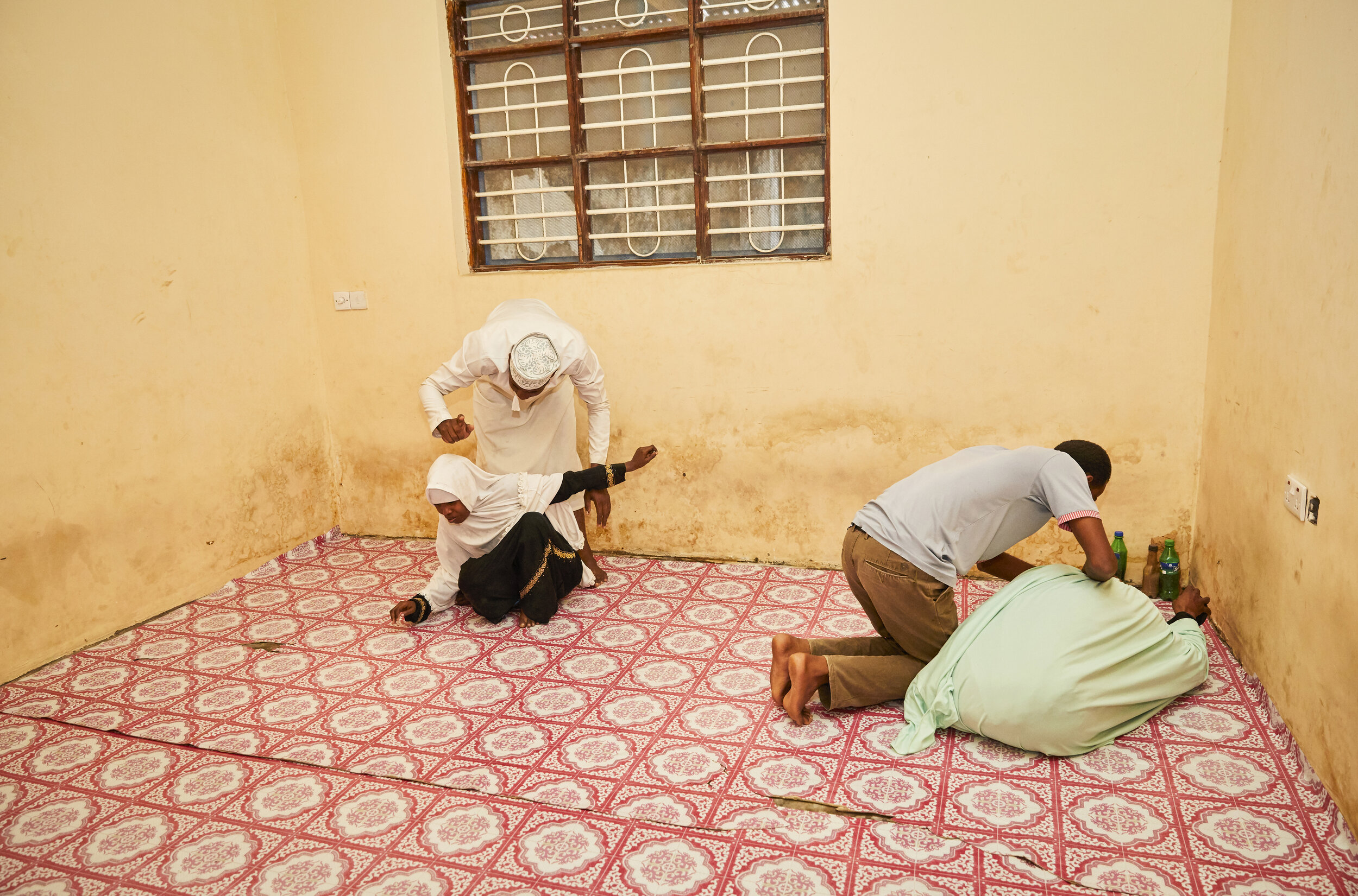  Two women believed to carry dark djinn (spirits) have private consultations with Sheikh Abdul Rahman &amp; Sheikh Nsoor at the Shifaa herbal clinic in Zanzibar City, Zanzibar. In order to push the djinni out that is believed to be causing their illn