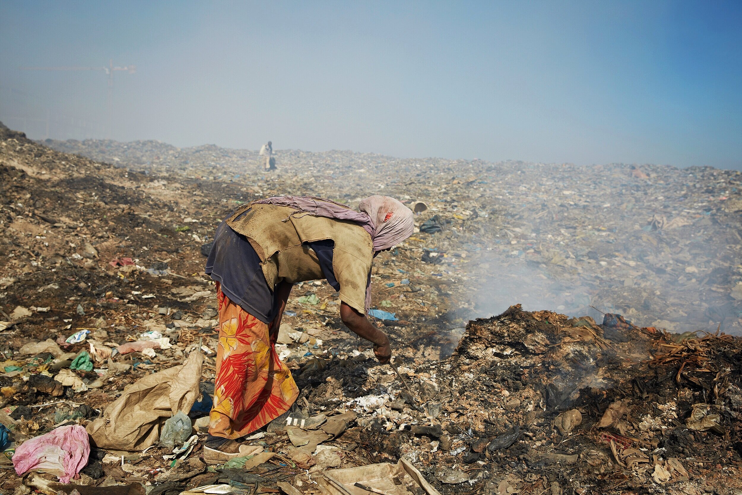  Liya Getachew, 26, sifts through rubbish in search of small metal items that she can resell. Each picker generally specializes in a material with the majority of women choosing metal as it requires a certain level of meticulousness. She started work