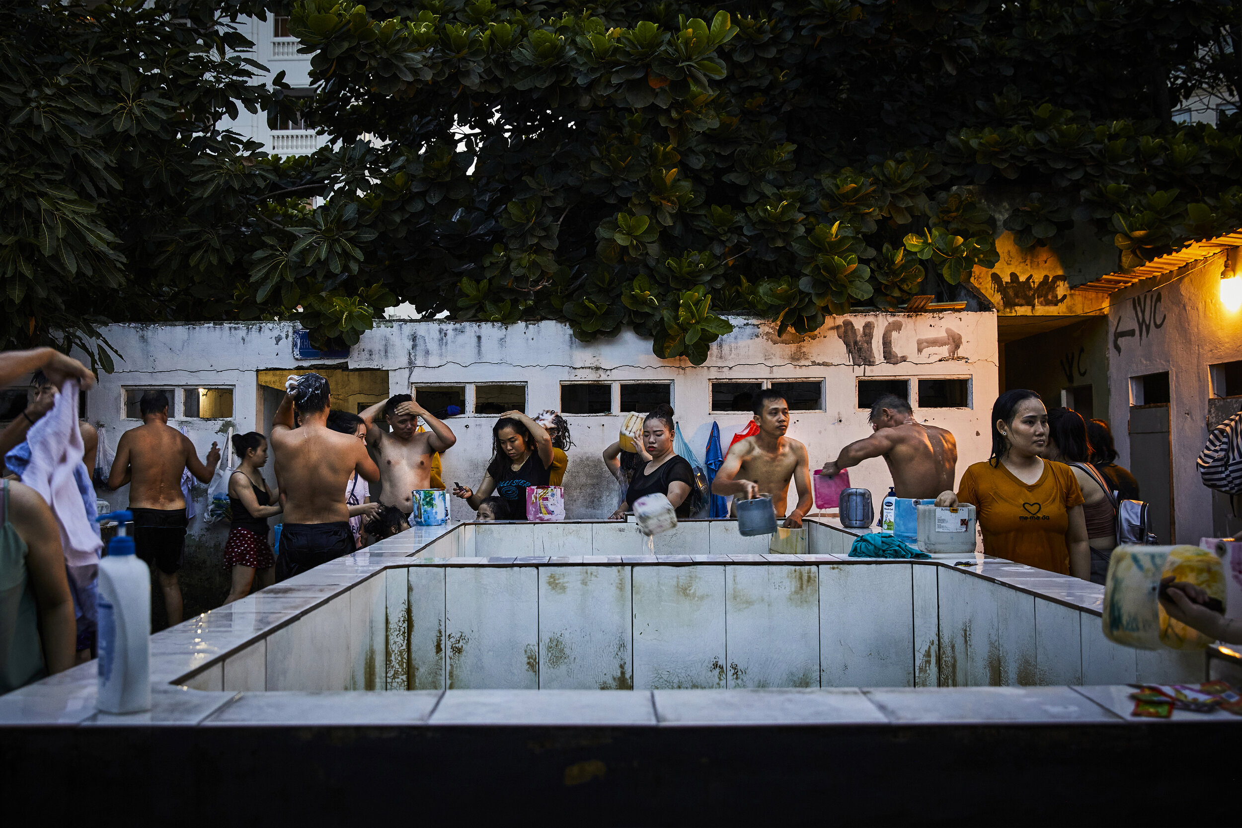  Beach-goers use packed communal shower areas to wash off the sand and sea as all believed that Vietnam had beaten the Coronavirus, so were comfortable being so close to each other without masks. Unfortunately, a 2nd wave in this city of Da Nang forc