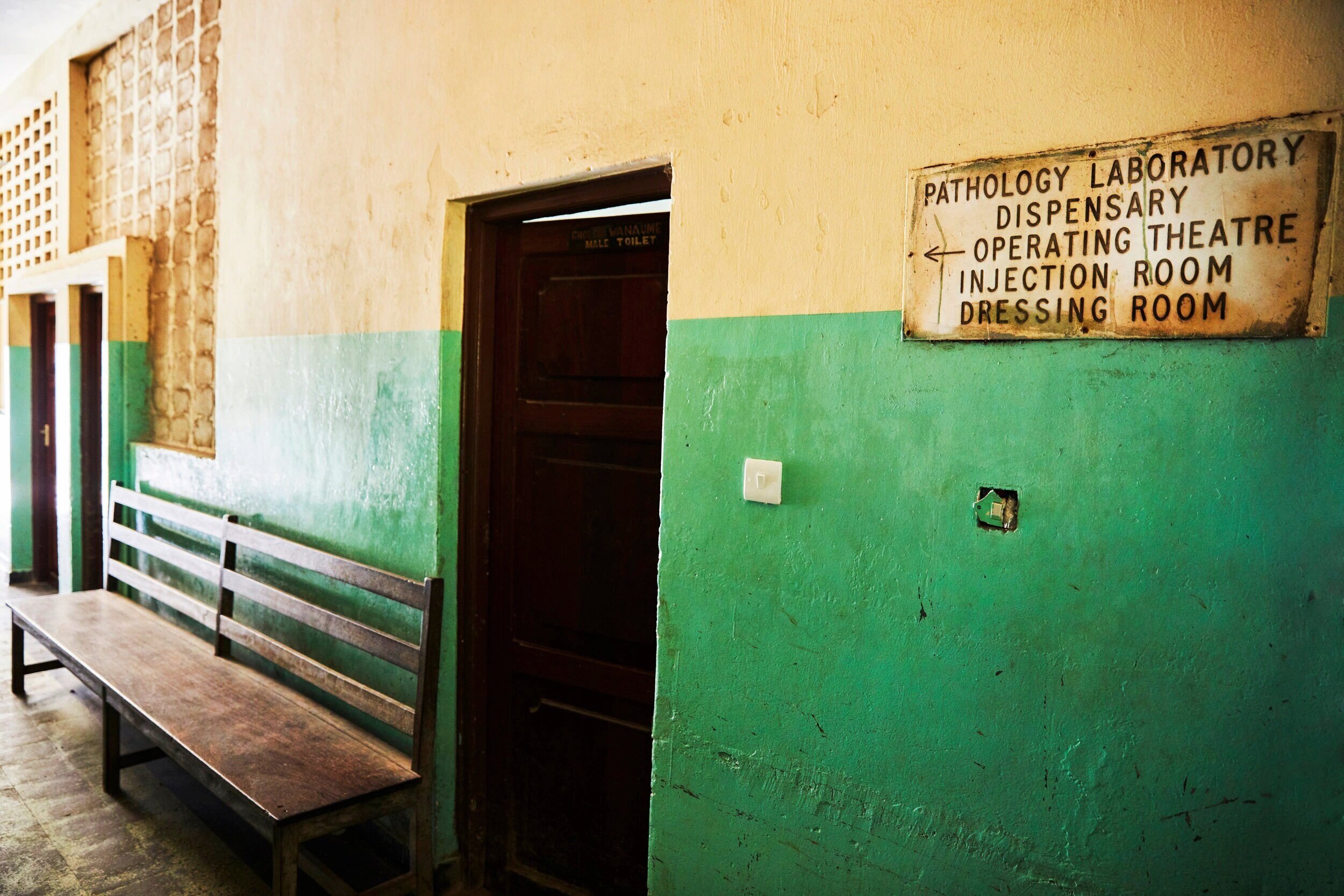  A sign giving directions at Mnazi Mmoja Hospital which is the largest government-funded hospital on the island.  