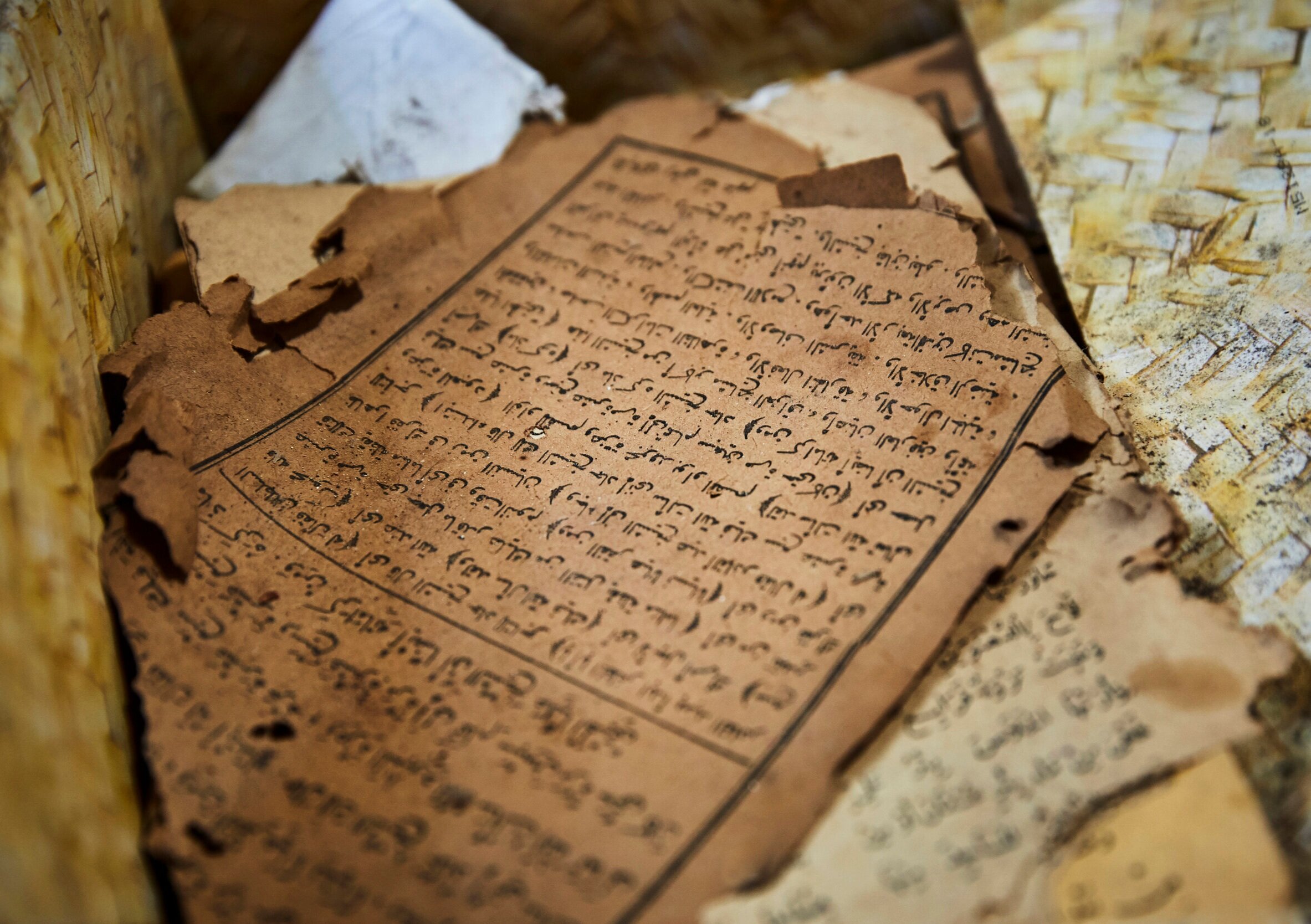  Worn pages of the Quran used in bestowing blessings by traditional healer, Mrisho Mohammed, in Jambiani village.  