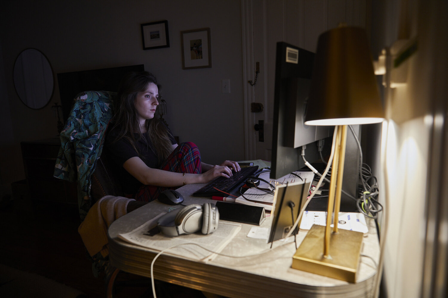  After another long day attending to the needs of her son, Kathleen sits at her desk to begin her work day. Though she feels lucky that her job, affords her the possibility of completing  assigned workloads in the evenings after she puts her son to b