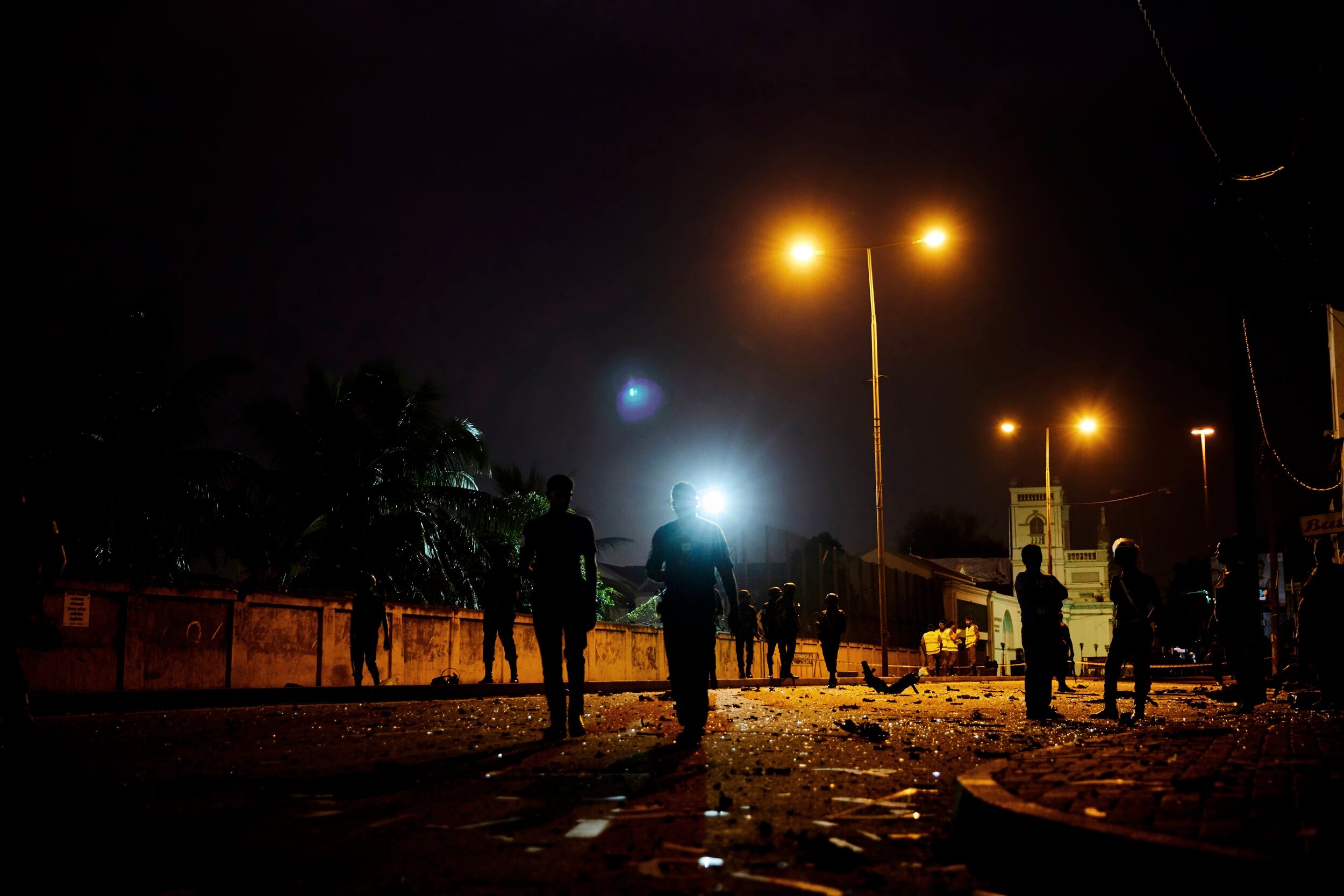  Broken glass near a detonated car bomb less than a block away from a church that was targeted during the Easter Sunday bombings  Colombo, Sri Lanka 