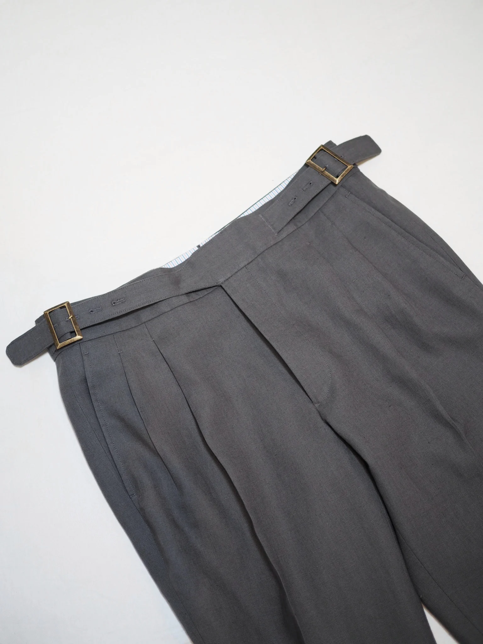 Irish linen with our ghurka configuration and double pleats.
