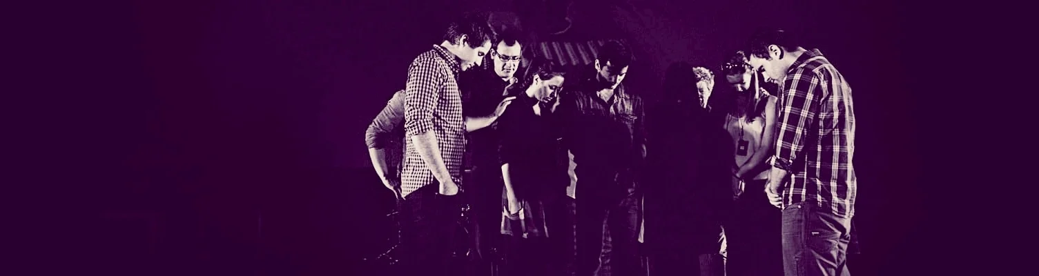 Praying together - from City on a Hill website