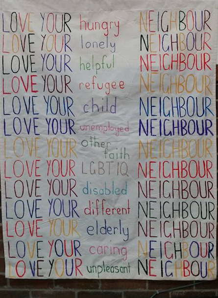“Love your neighbour” wall hanging.